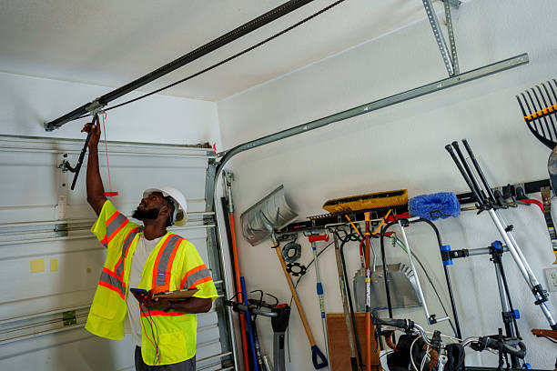 Professional Garage Door Installation technician working in Little Falls, NY
